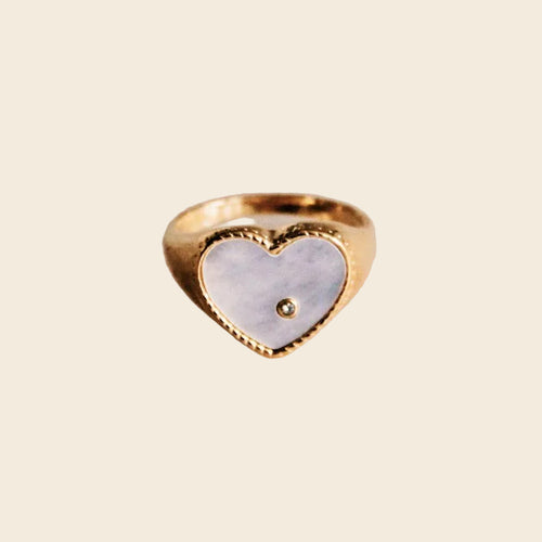 Gold ring with mother-of-pearl heart