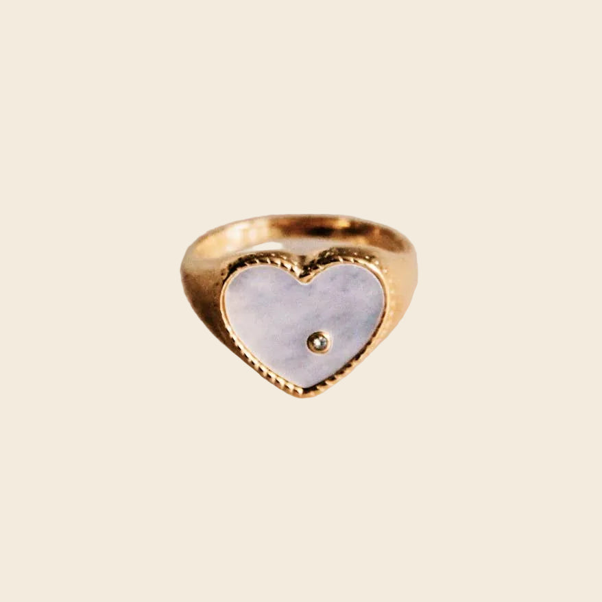 Gold ring with mother-of-pearl heart